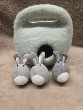 Lovevery Bunnies in a Felt Hide And Seek Burrow toy